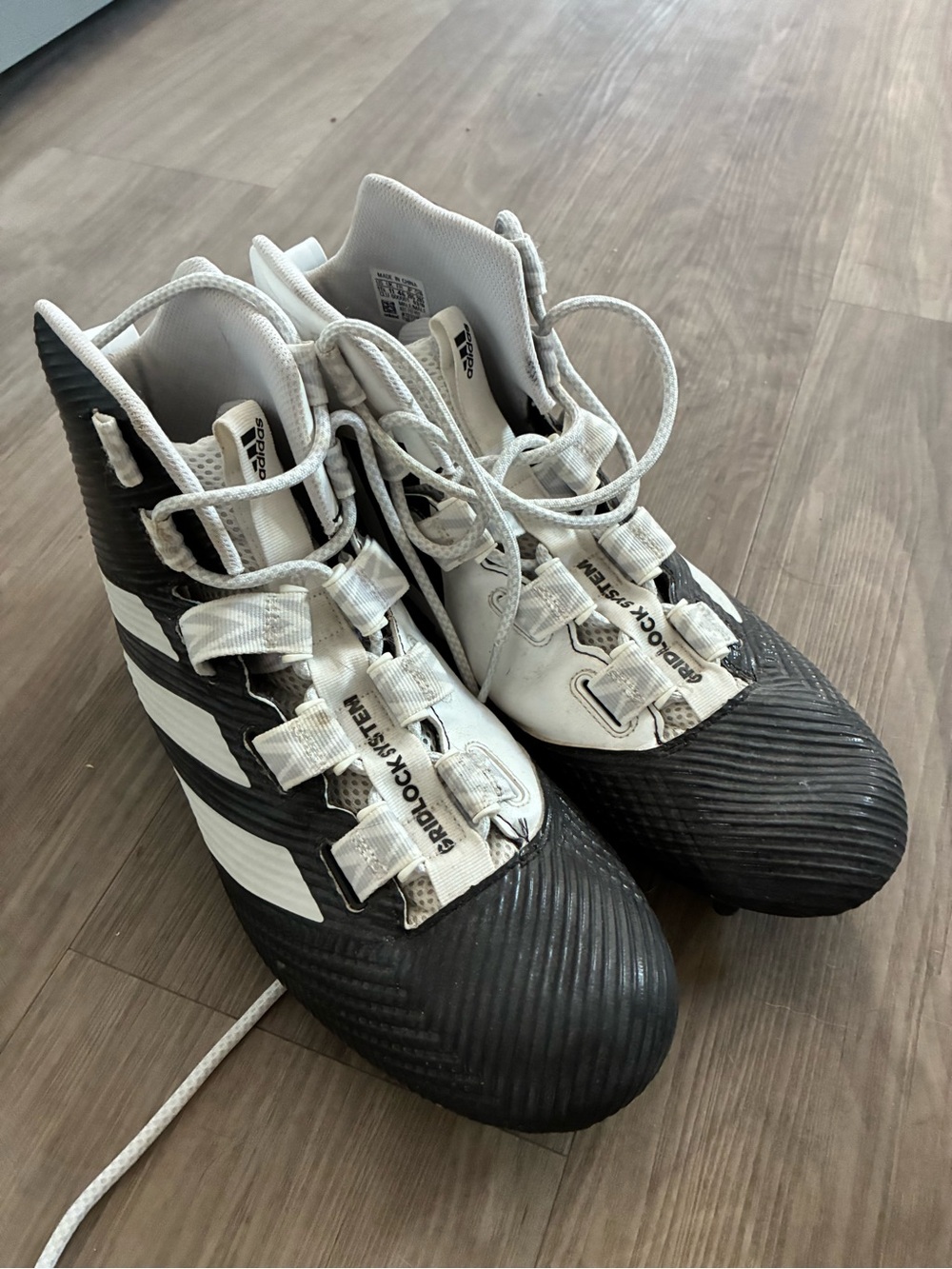 Adidas Men’s Black and White football Cleats